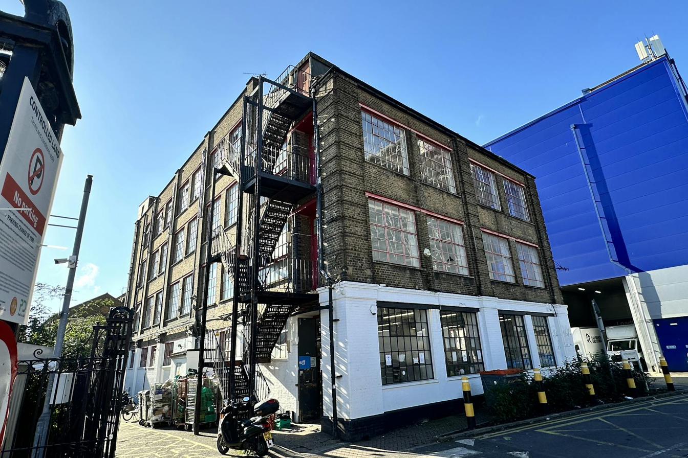 The Vale Studios — three-storey Victorian warehouse on The Vale, W3, with steel-frame factory windows
